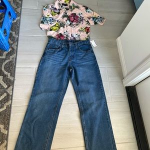 Relaxed fit jeans and Hawaiian shirt.